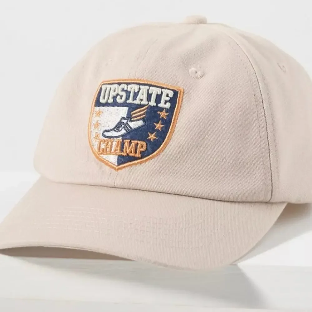 BY ANTHROPOLOGIE NWT Varsity Patch Upstate Champ Baseball Cap Beige Sporty Prep